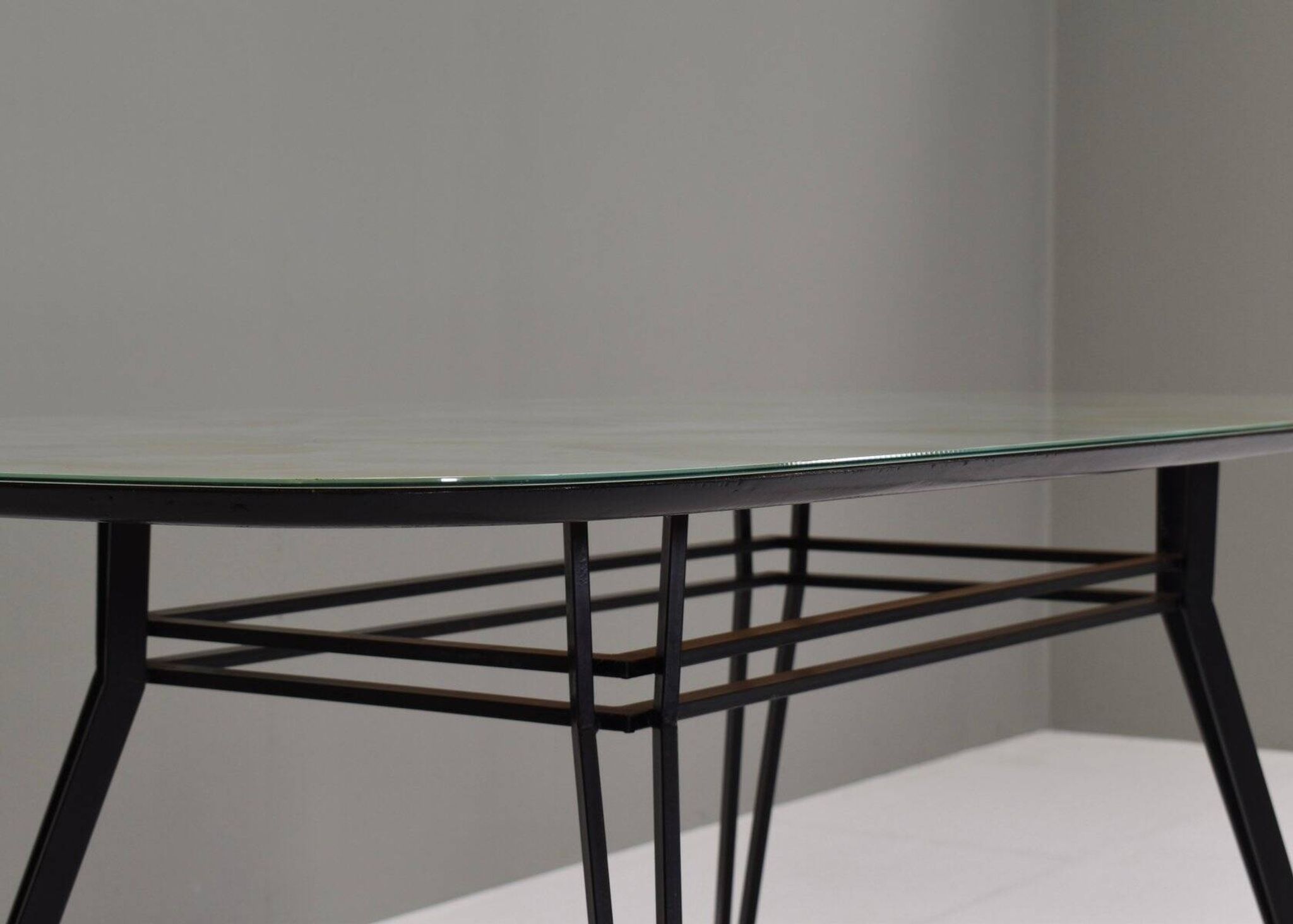 Italian dining table with metal base and glass top and brass, 1950s