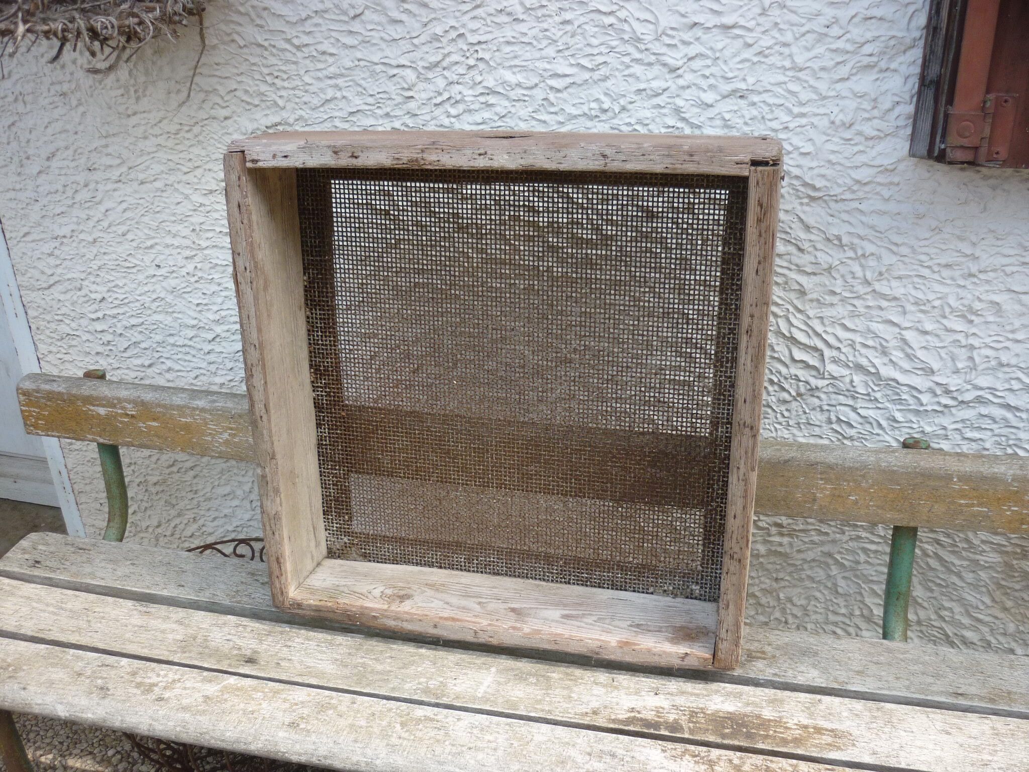 Old wooden mason sieve