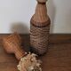 Glass and rattan bottle