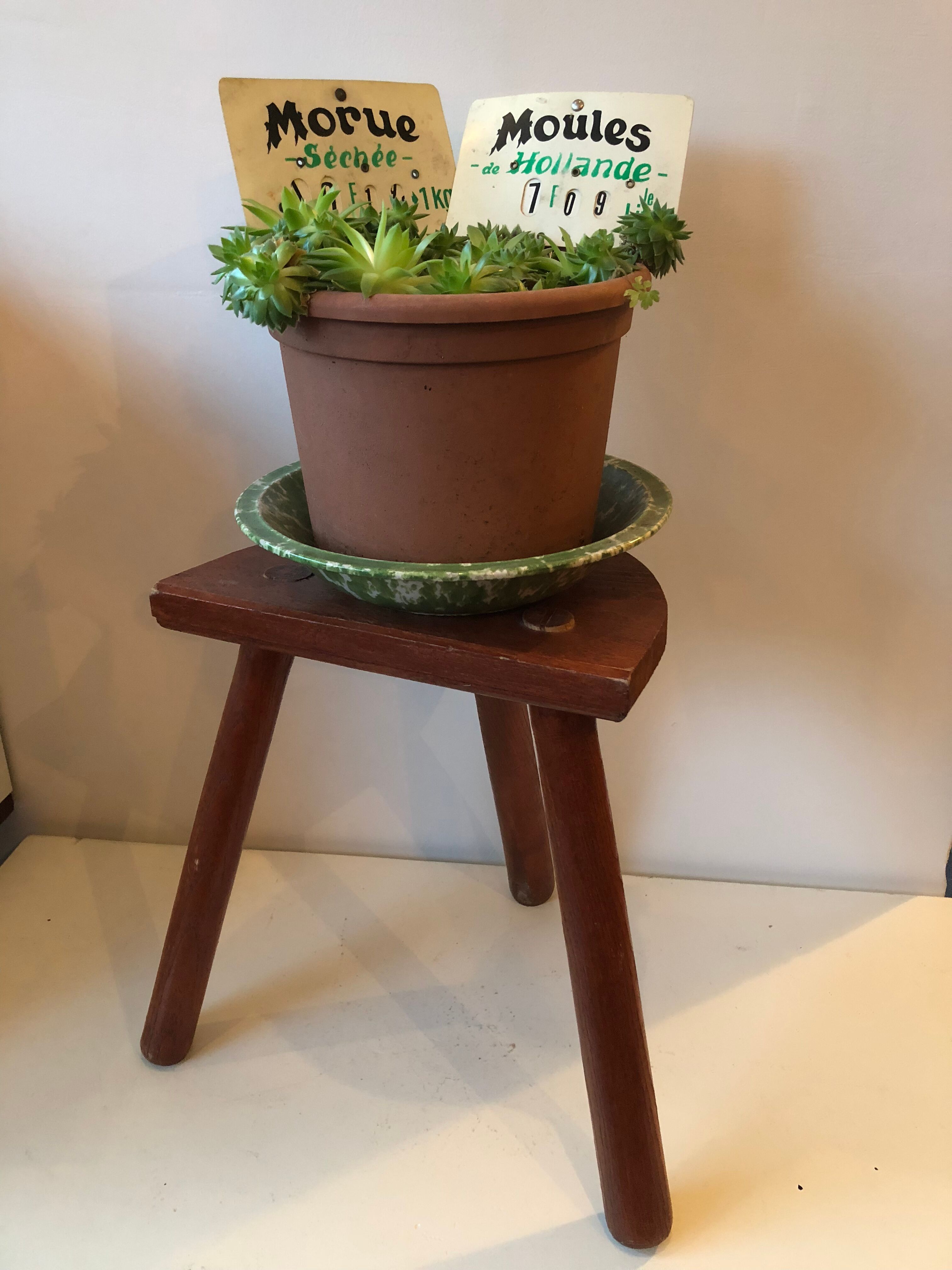 Old wooden tripod stool