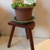 Old wooden tripod stool