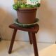 Old wooden tripod stool
