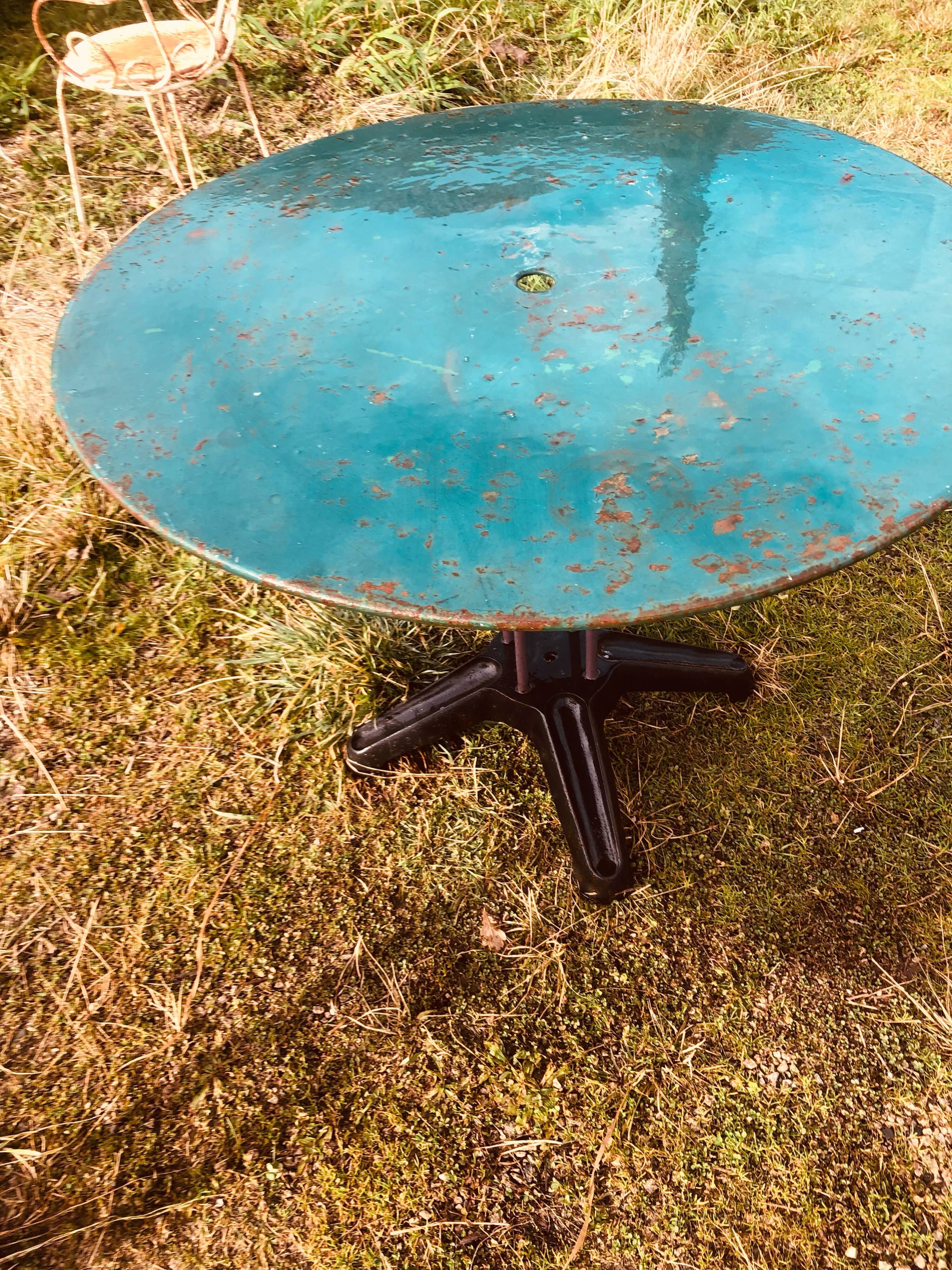Two metal garden tables make up
