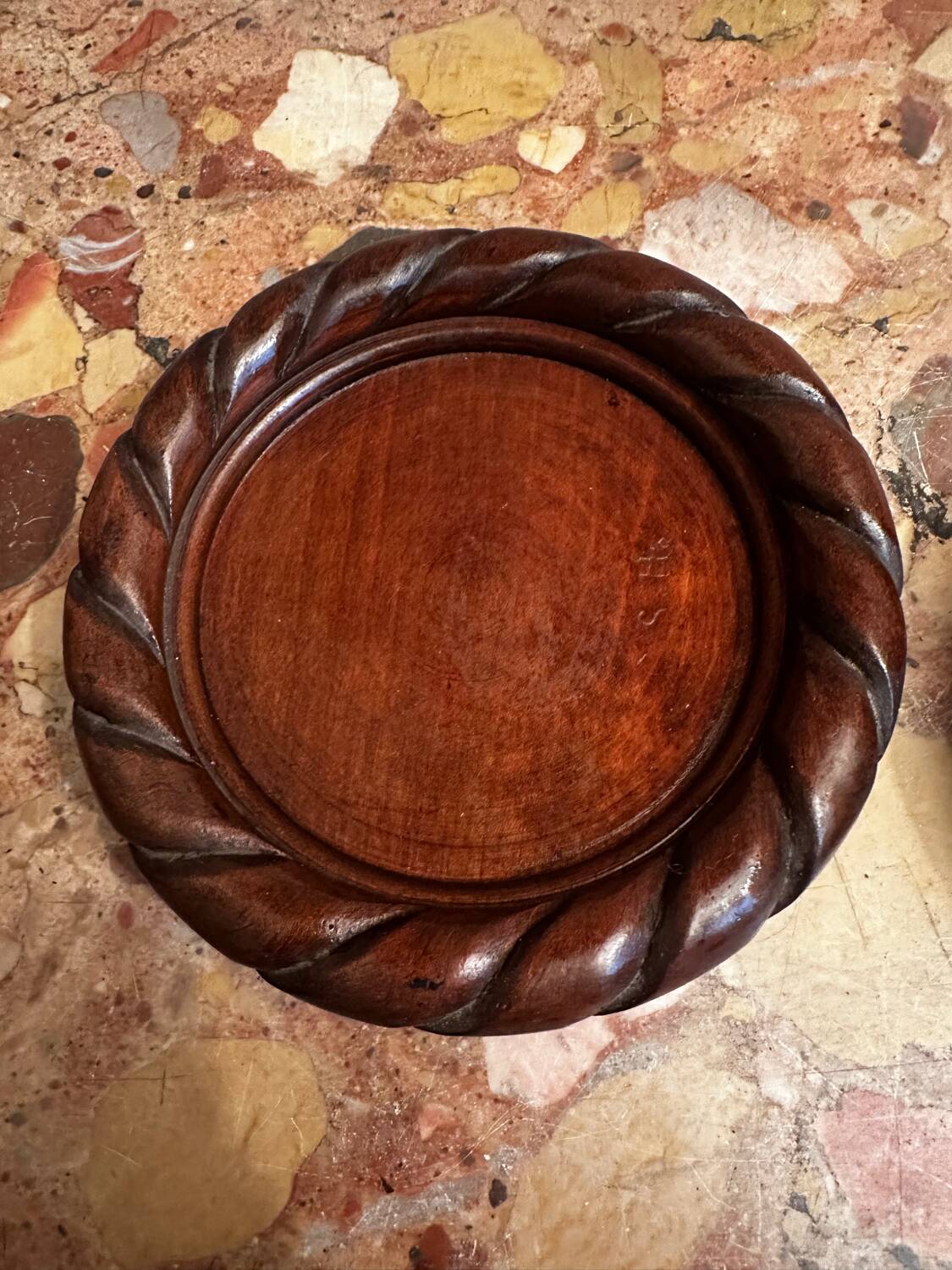 Pair of turned and carved wooden bottle coasters from the 1950s.