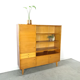 Vintage wooden sideboard with sliding glass doors and drawers