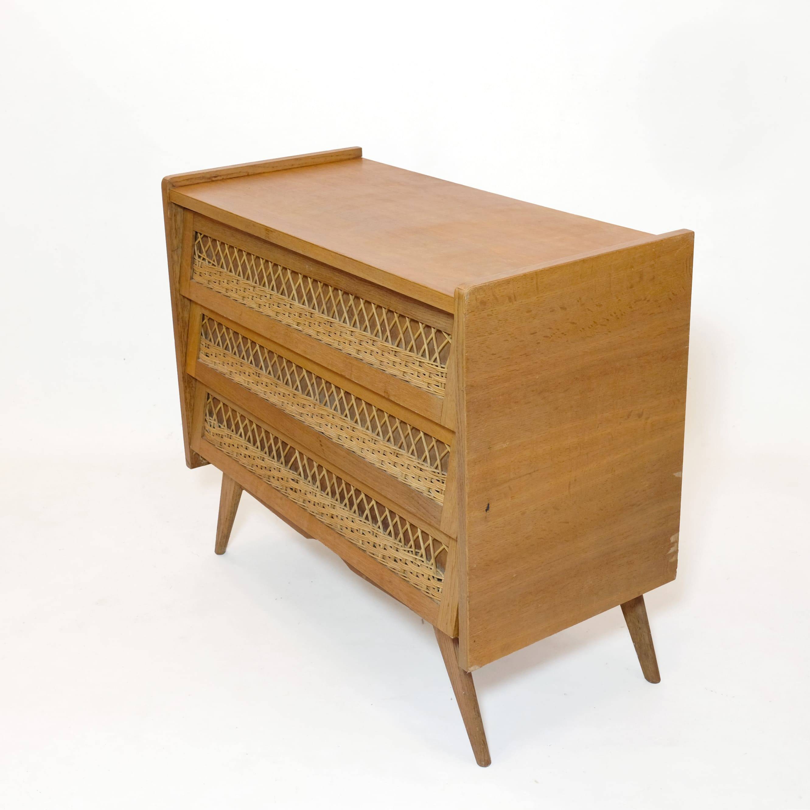 Wooden and rattan chest of drawers from the 60s.