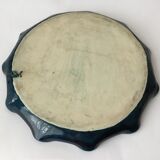 Decorative plate in relief with floral motif