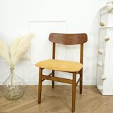 Scandinavian chair with mustard yellow fabric