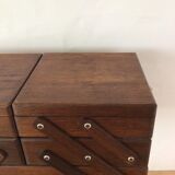 Worker on wooden feet