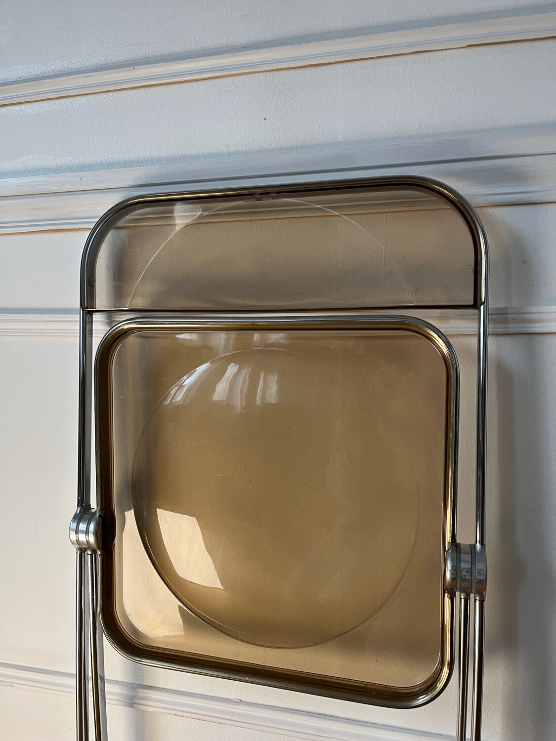 Plia folding chair by Giancarlo Piretti Castelli