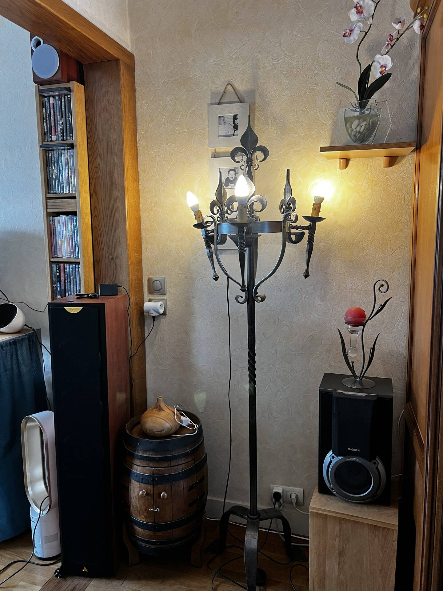 Medieval-style floor lamp, made of wrought iron.