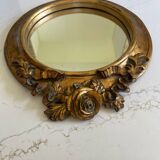 Miroir rond en bois sculpté