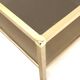 Large vintage Hollywood Regency coffee table made of brass and smoked glass from the 1970s