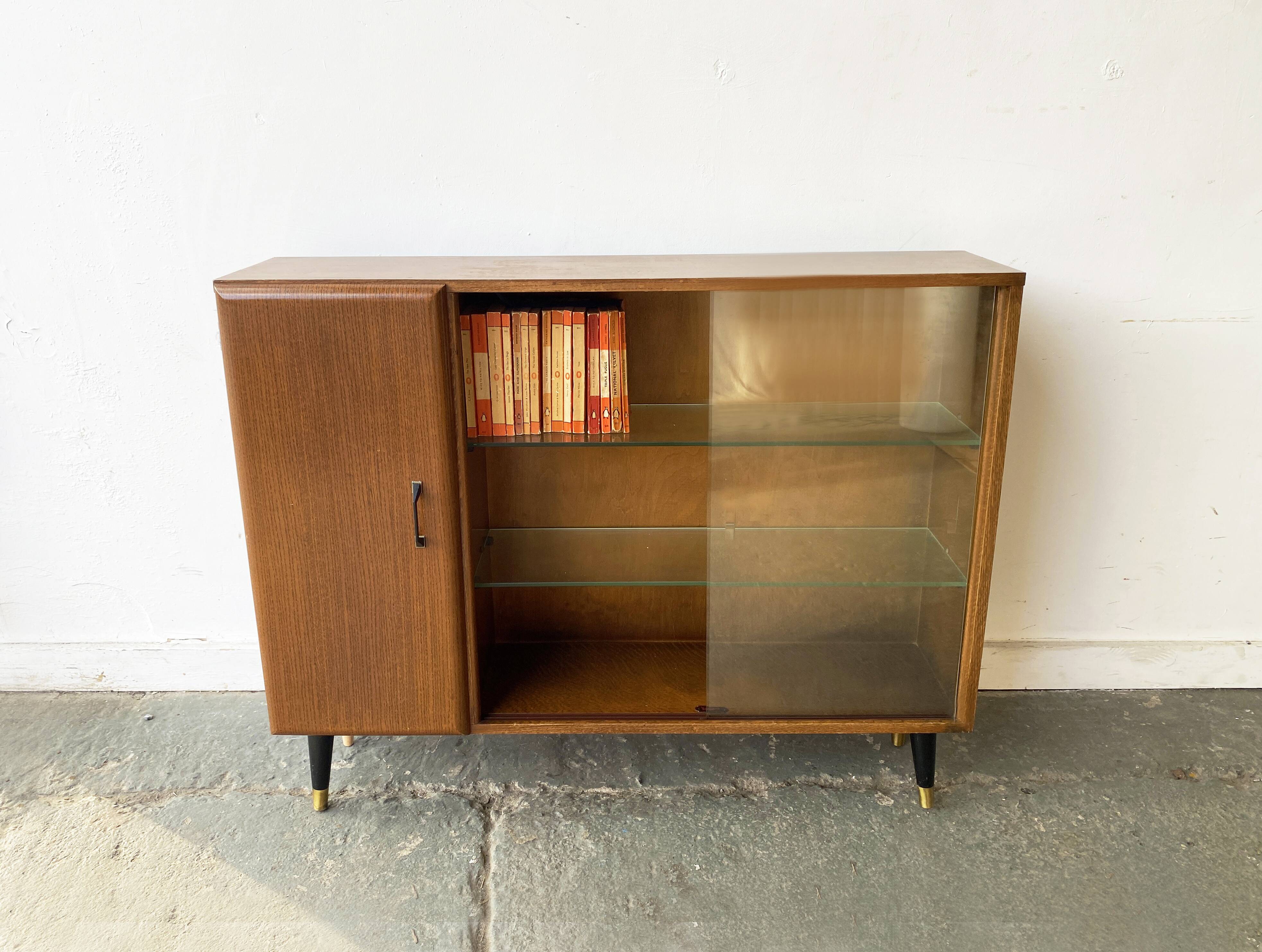 Mid Century vintage  bookcase with sliding glass doors by Turnidg