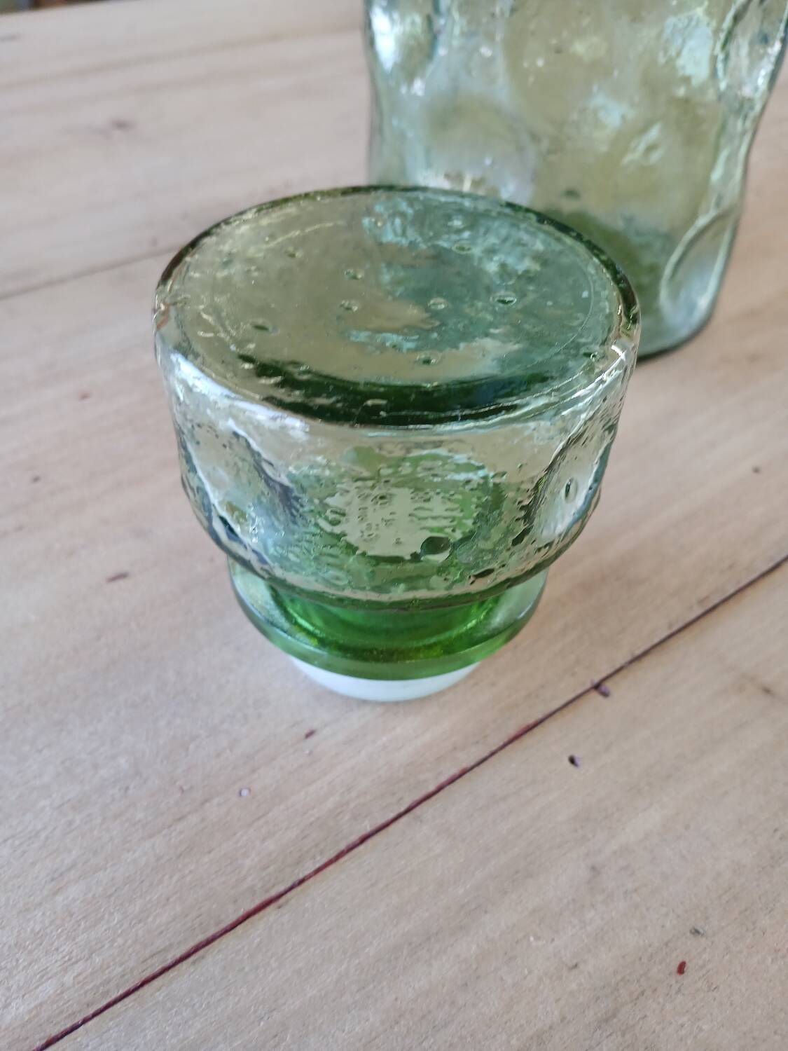 Antique green carafe