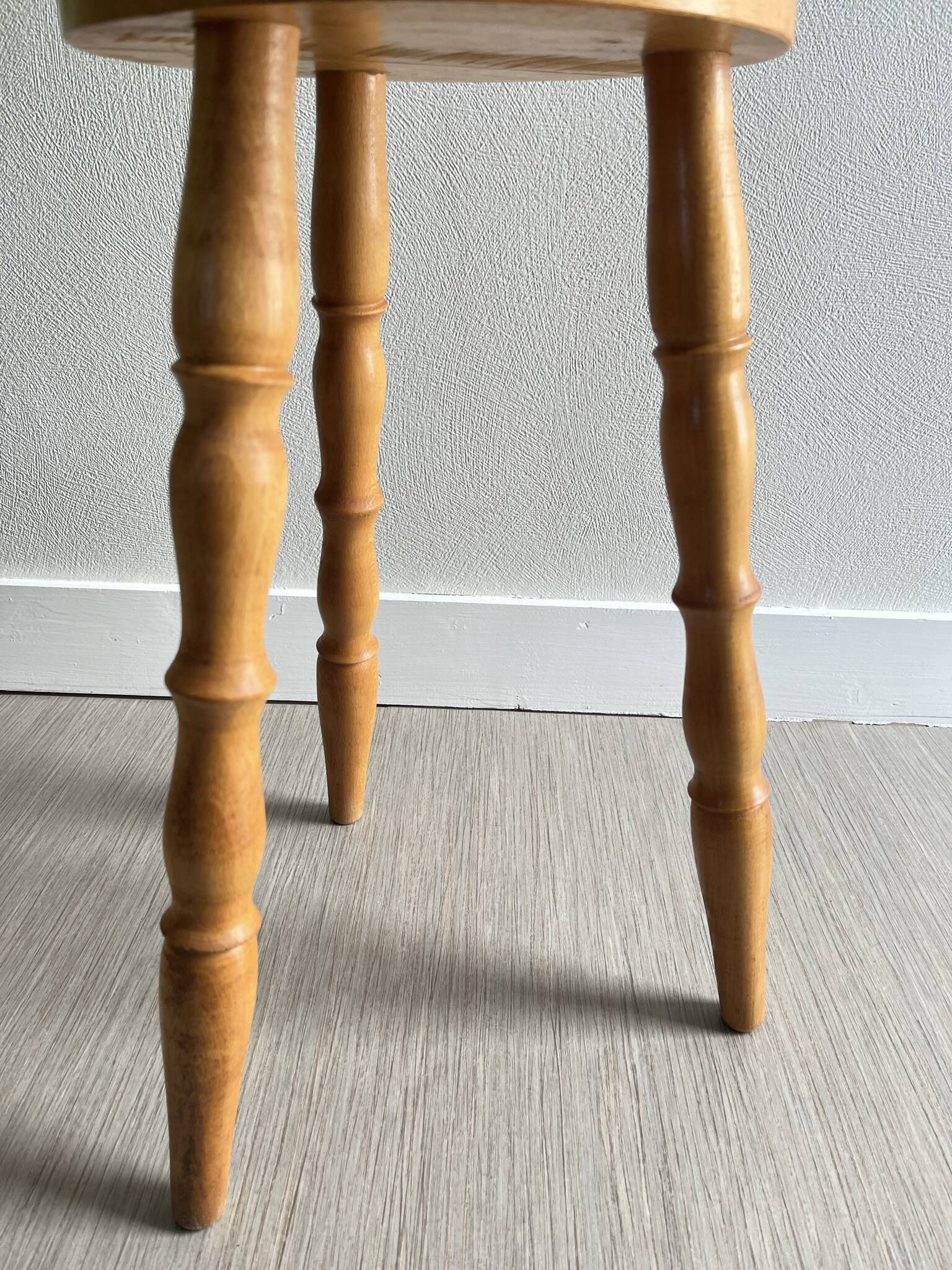 Wooden tripod stool
