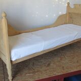 Retractable sofa bed of the Austrian Tyrole in natural wood