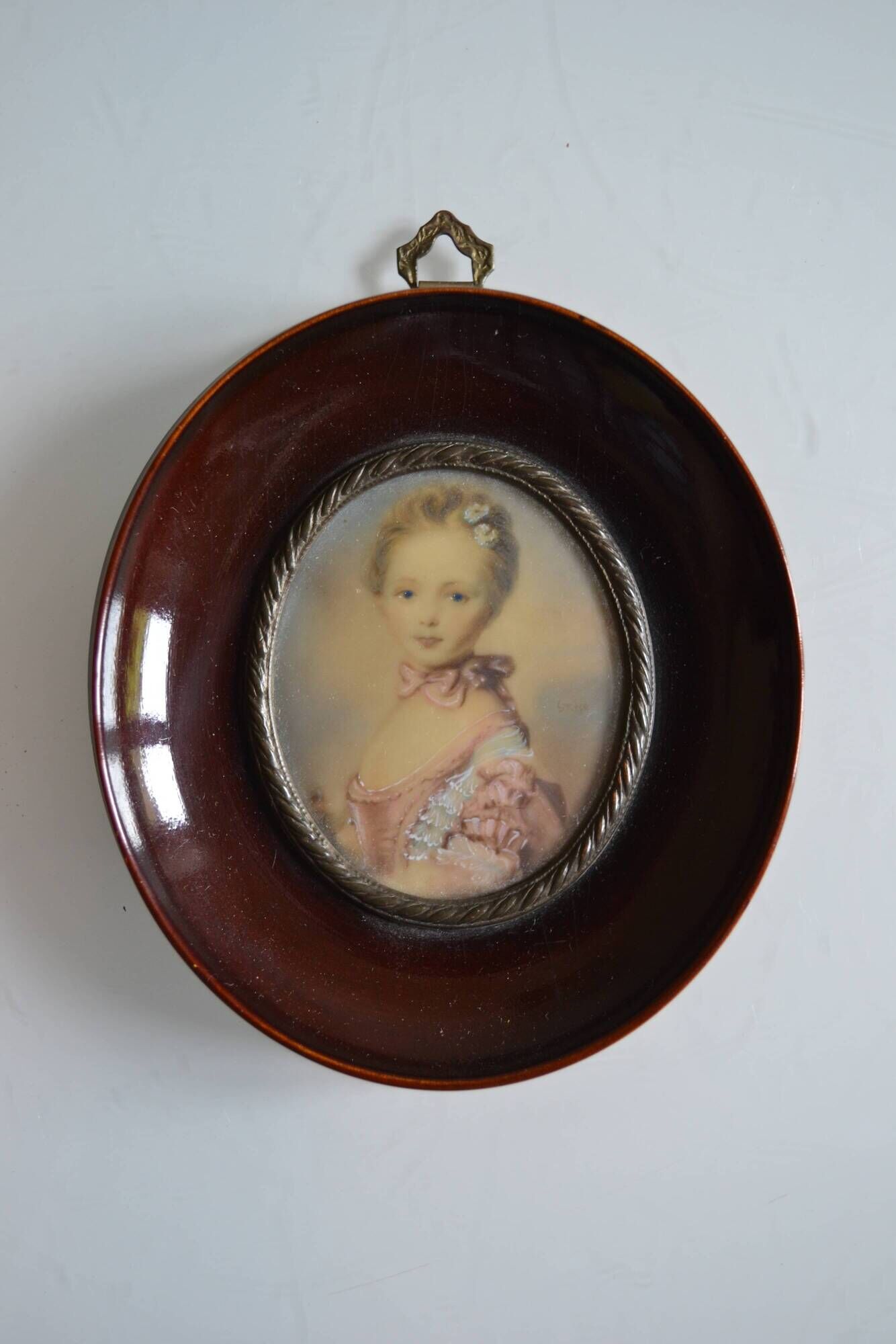 Miniature portrait of a young girl, framed and under glass