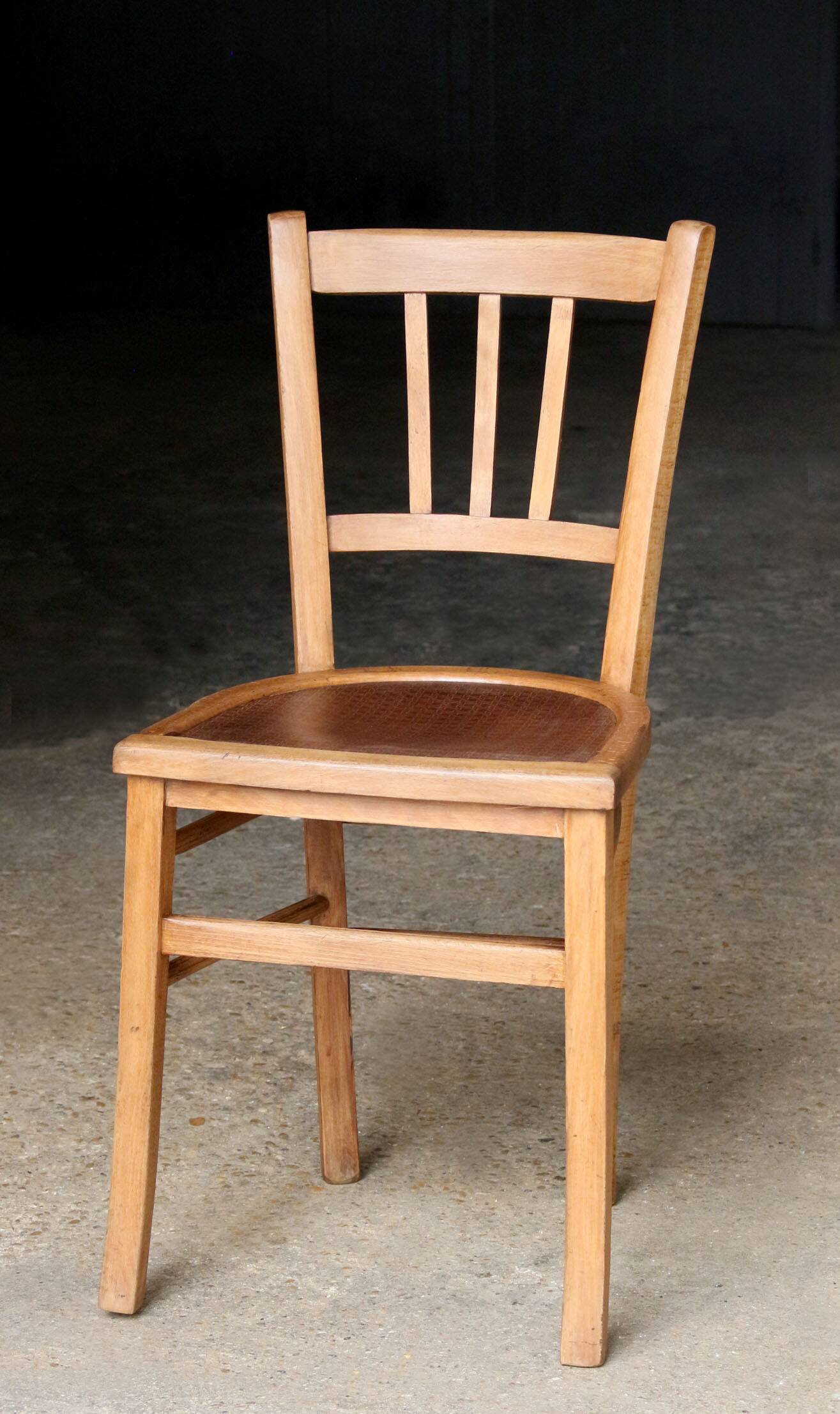 Early 20th century wooden bistro chair.