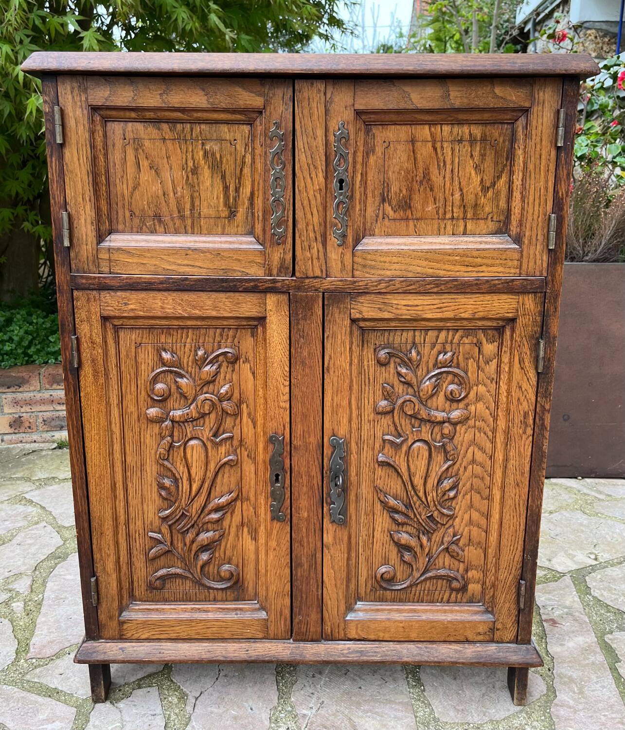 Low carved wooden sideboard