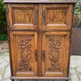 Low carved wooden sideboard