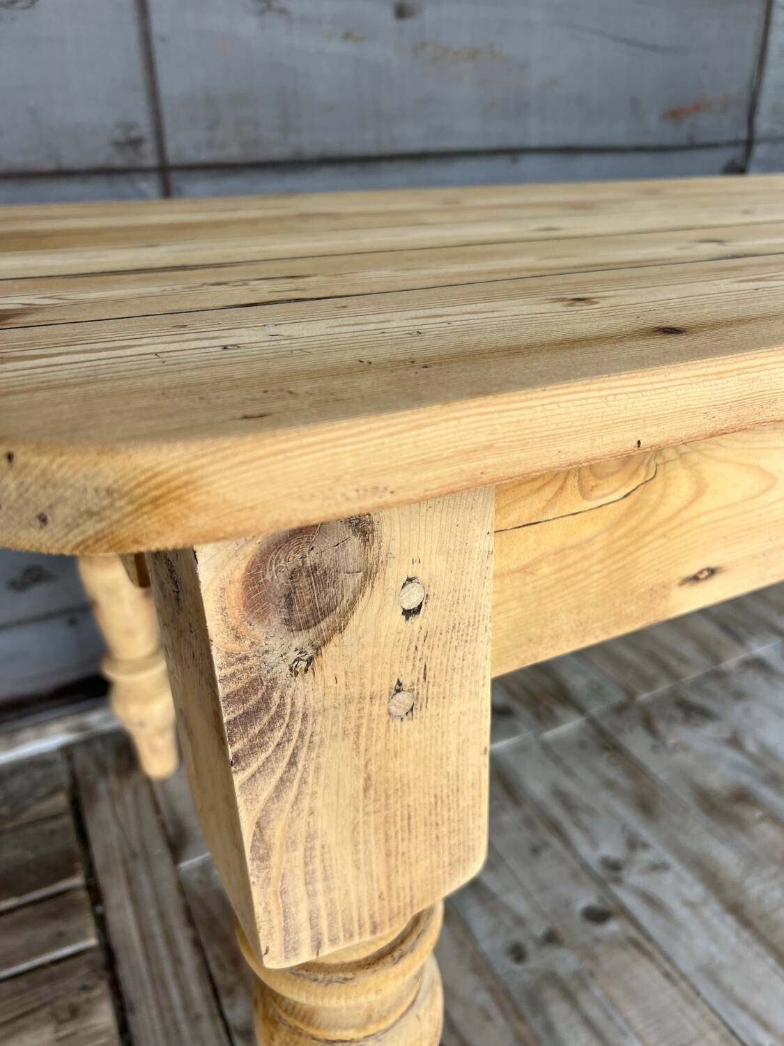 Old farmhouse table in raw wood