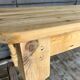 Old farmhouse table in raw wood