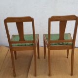 lot of 2 wooden chairs and green velvet