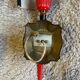 Pair of circa 70s plastic and brass wall lights