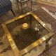 Gold square coffee table and smoked glass