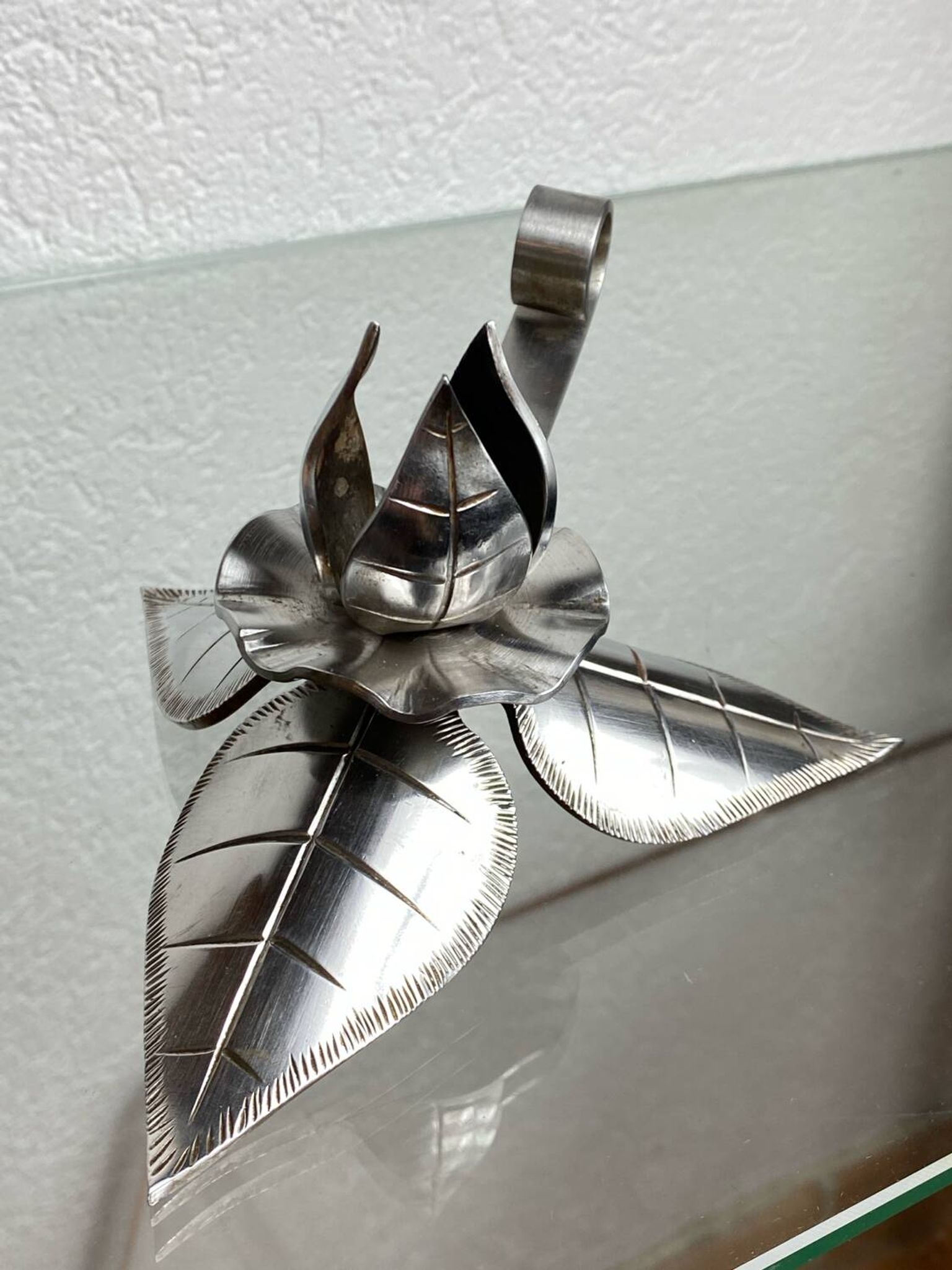 Silver-plated metal flower candle holder