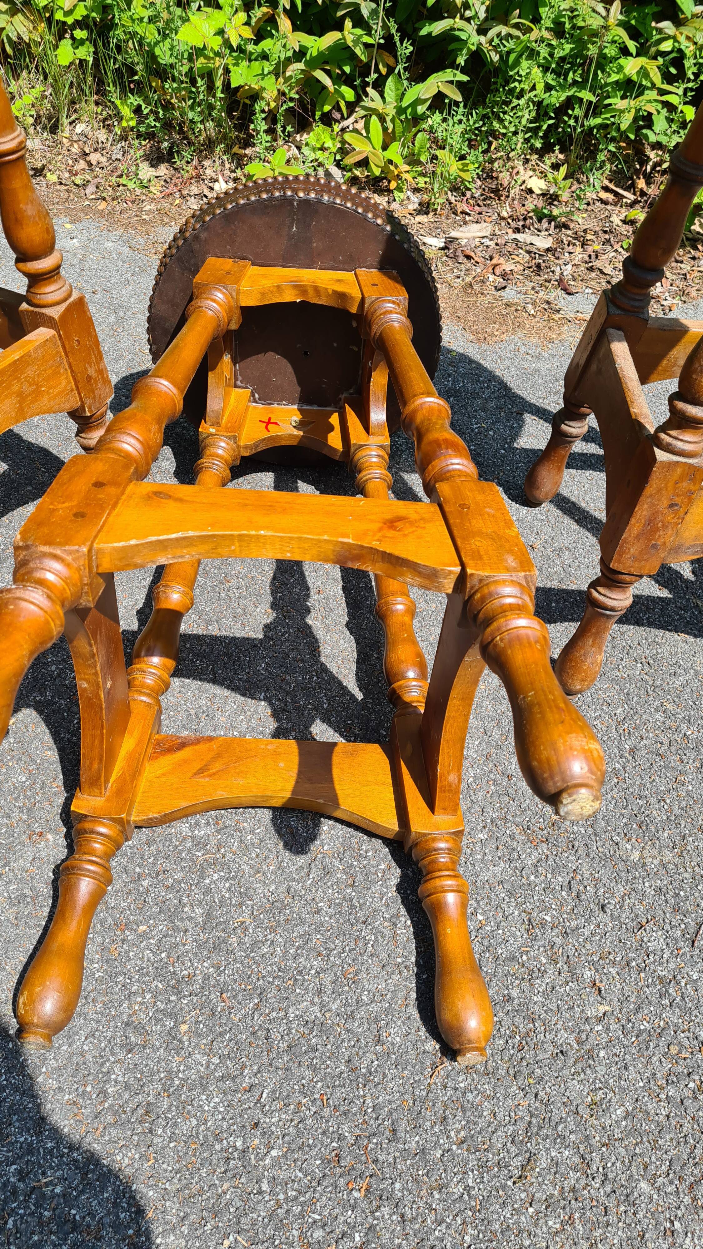4 old leather and wood stools