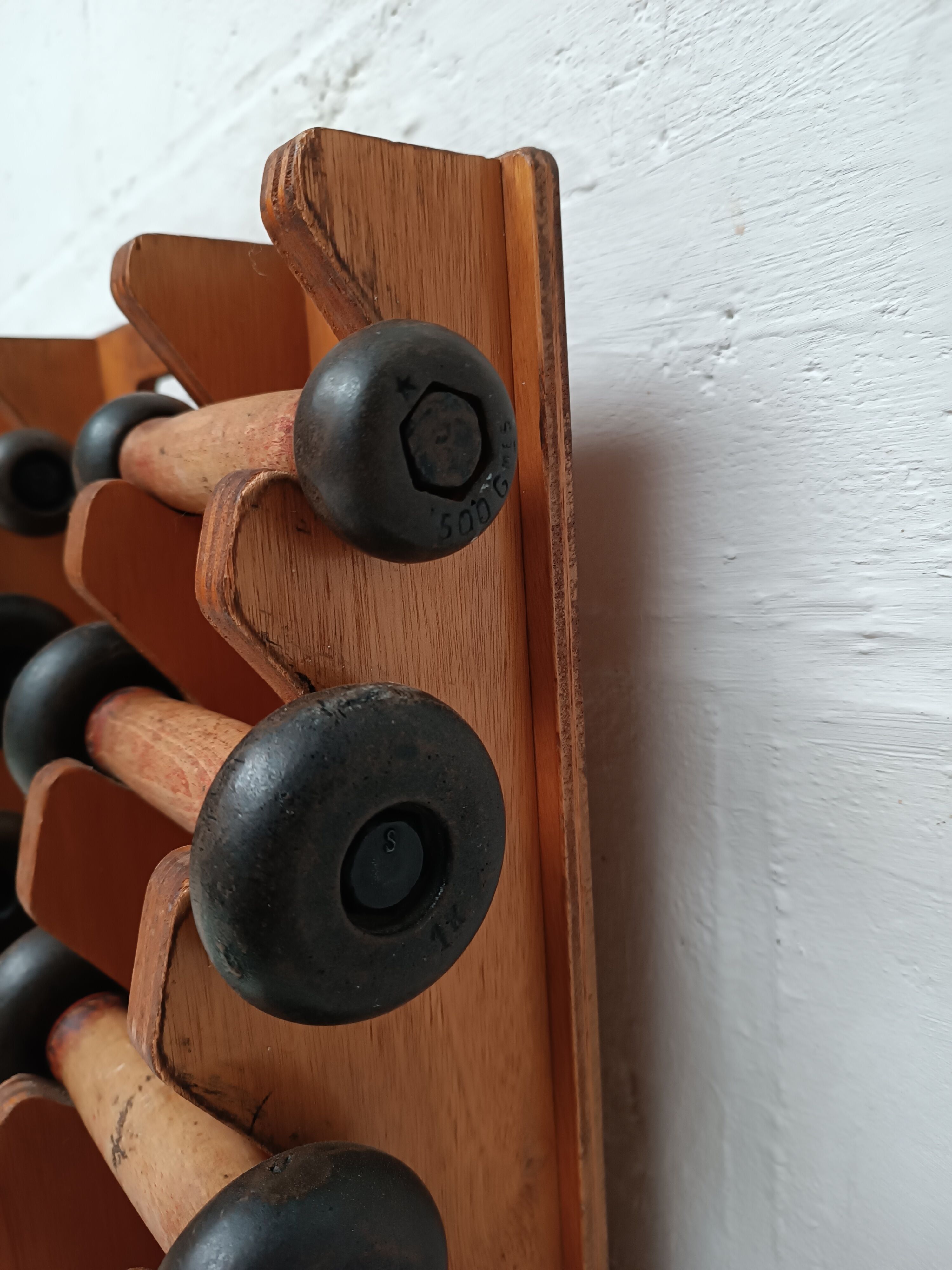 60s dumbbell wall display