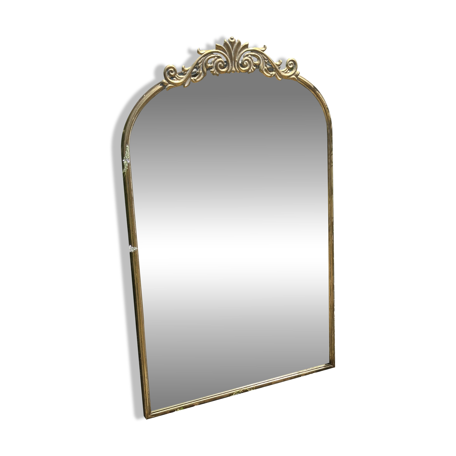 Golden metal pediment mirror from the 2000s.