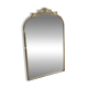 Golden metal pediment mirror from the 2000s.