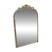 Golden metal pediment mirror from the 2000s.