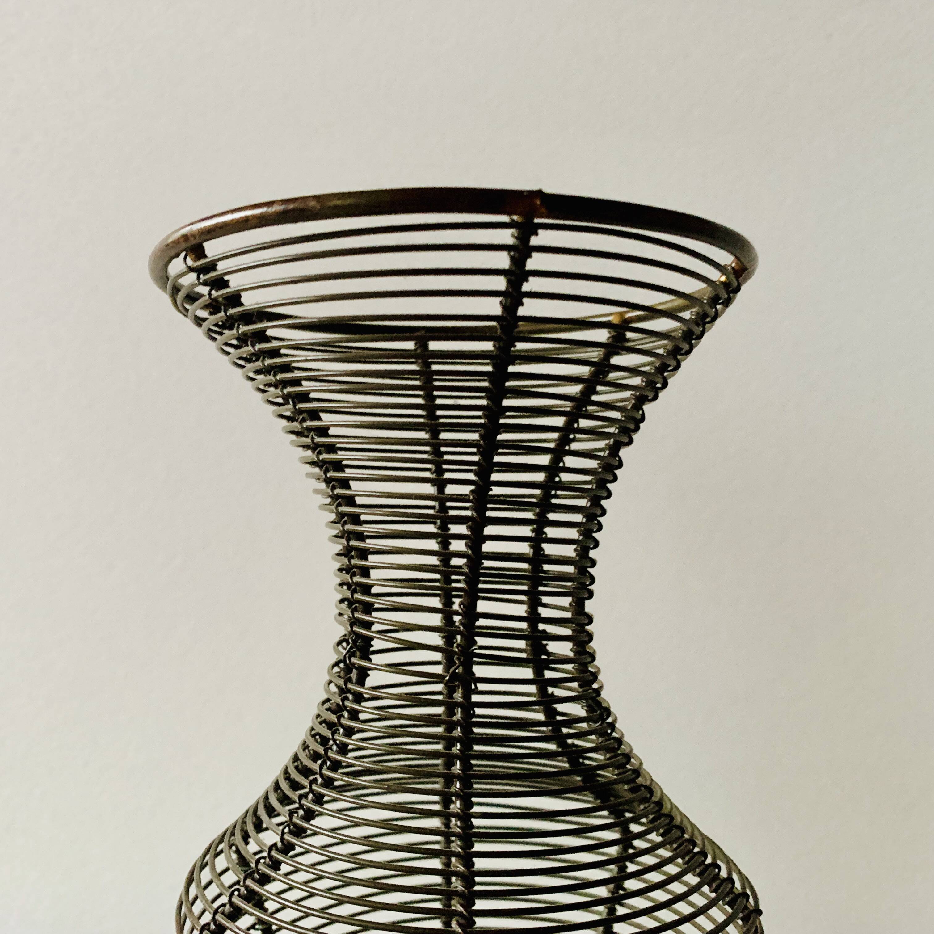 Old decorative wire vase