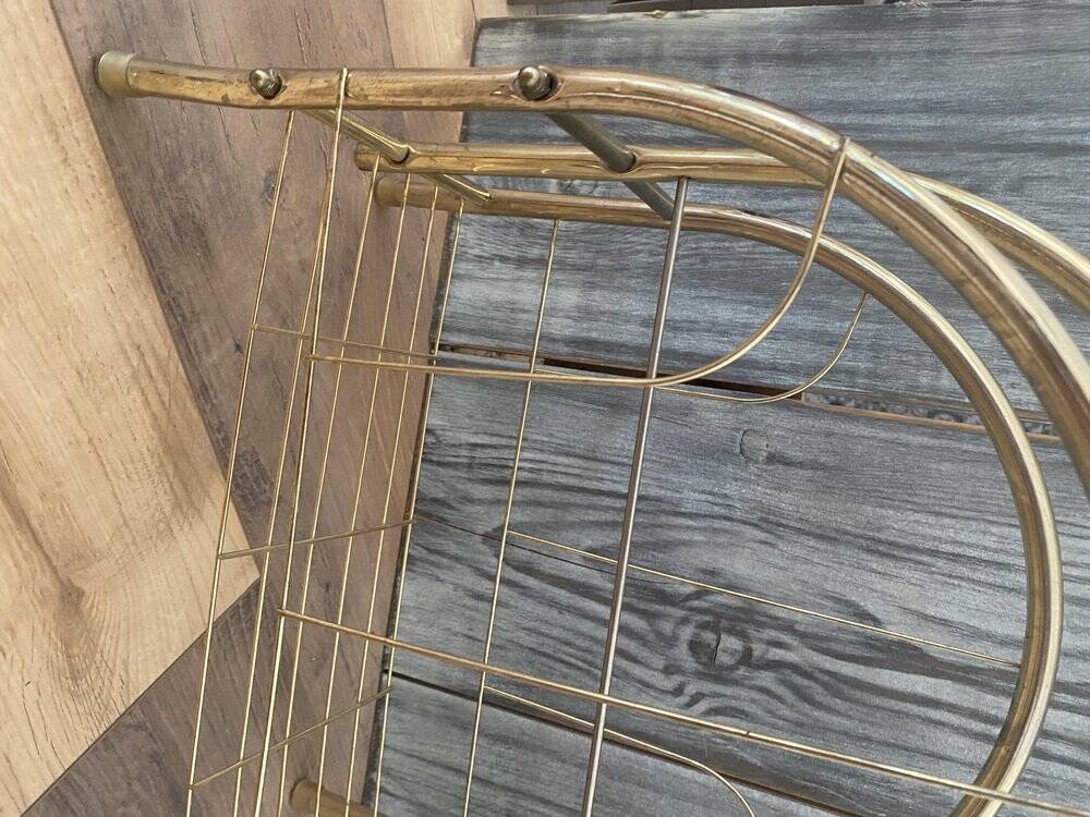 Vintage 1970s brass magazine rack, Mid-Century openwork architectural style.