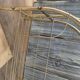 Vintage 1970s brass magazine rack, Mid-Century openwork architectural style.