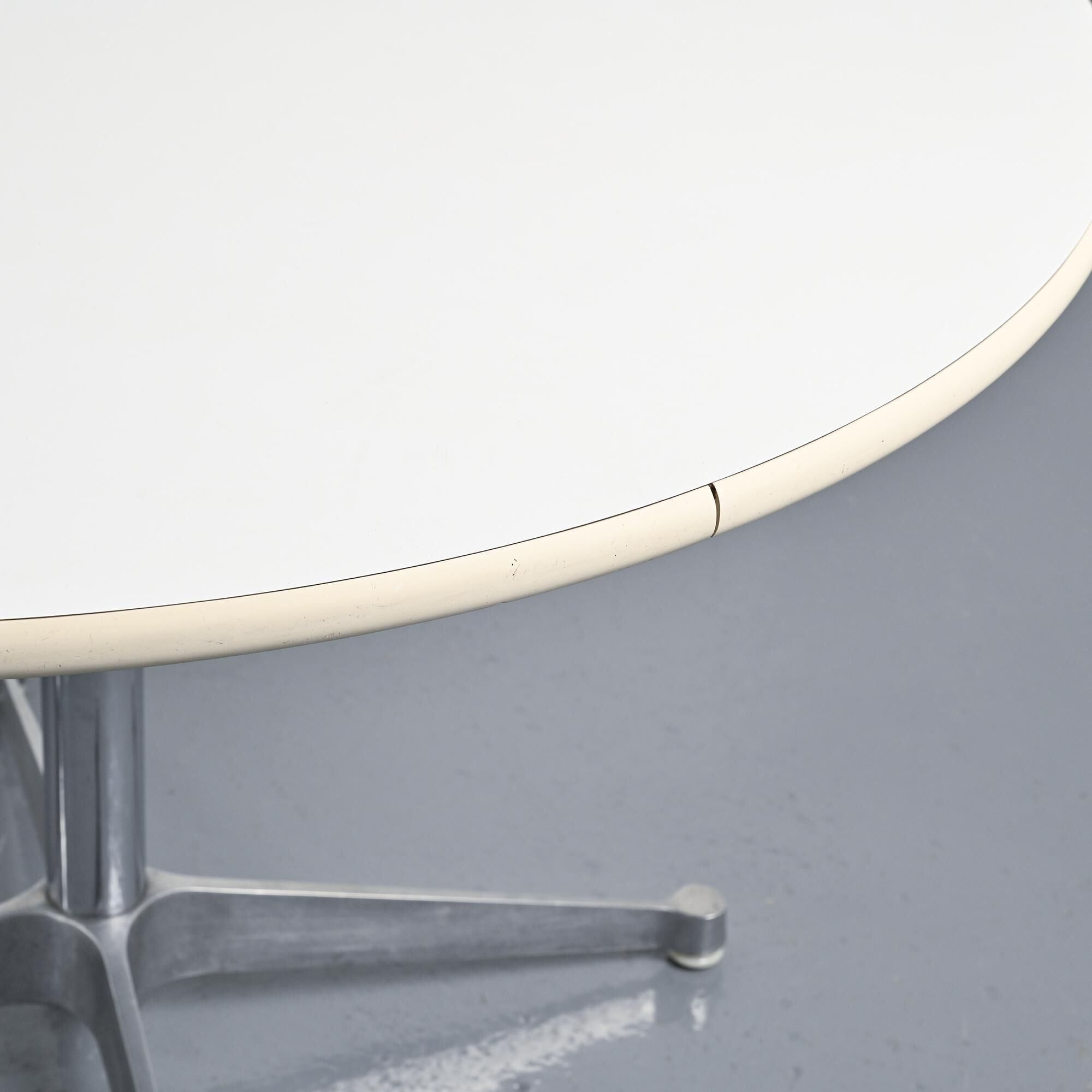 Round table by Charles and Ray Eames for Herman Miller, circa 1970.