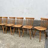 Set of 8 vintage bistro chairs – Warm stained wood – Compass legs