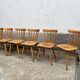 Set of 8 vintage bistro chairs – Warm stained wood – Compass legs