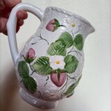 Barbotine pitcher with pastel flower decoration