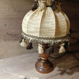 Wood bedside lamp with dome shade in granny chic style.