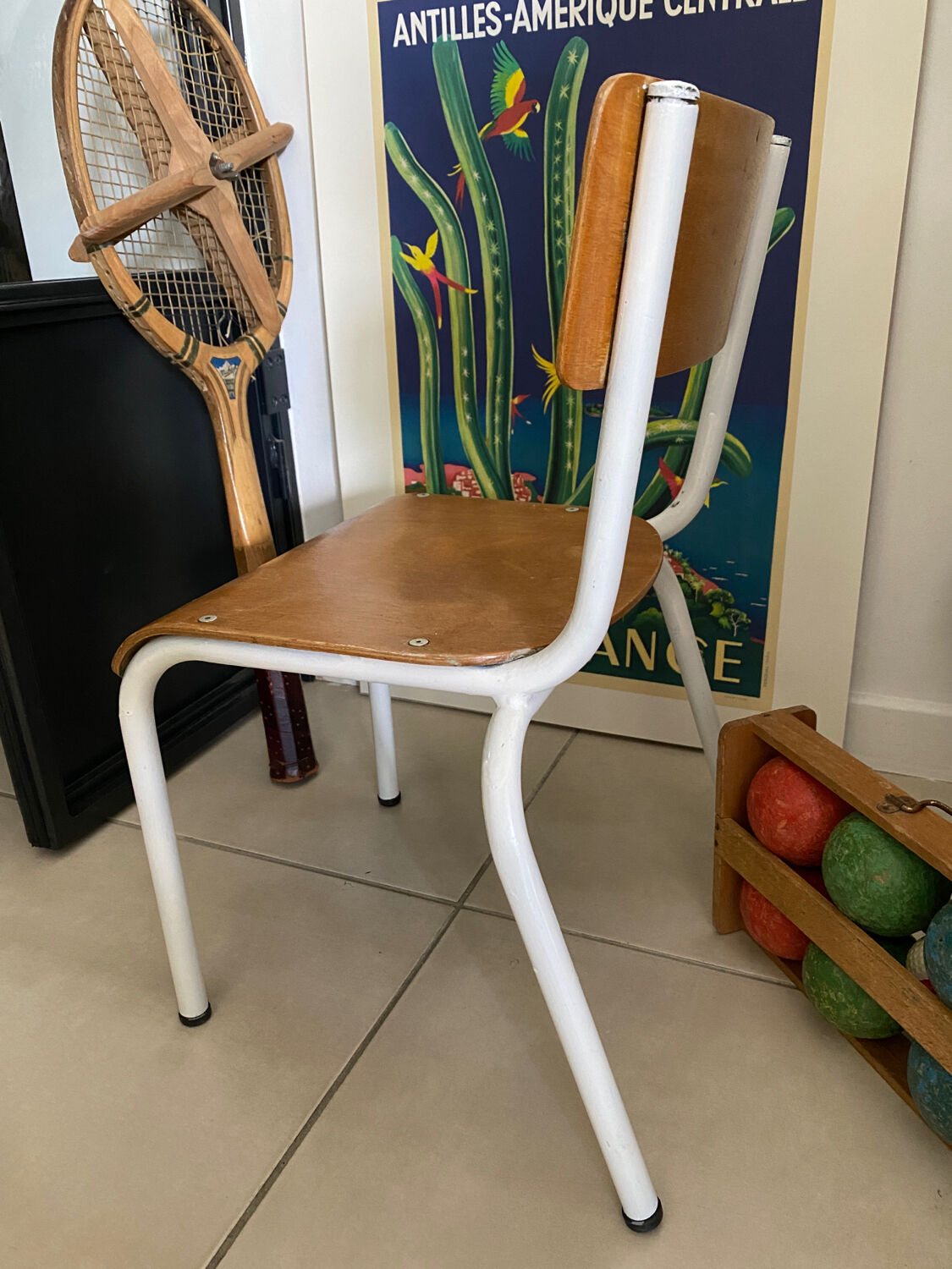 Old wooden and metal children's school chair