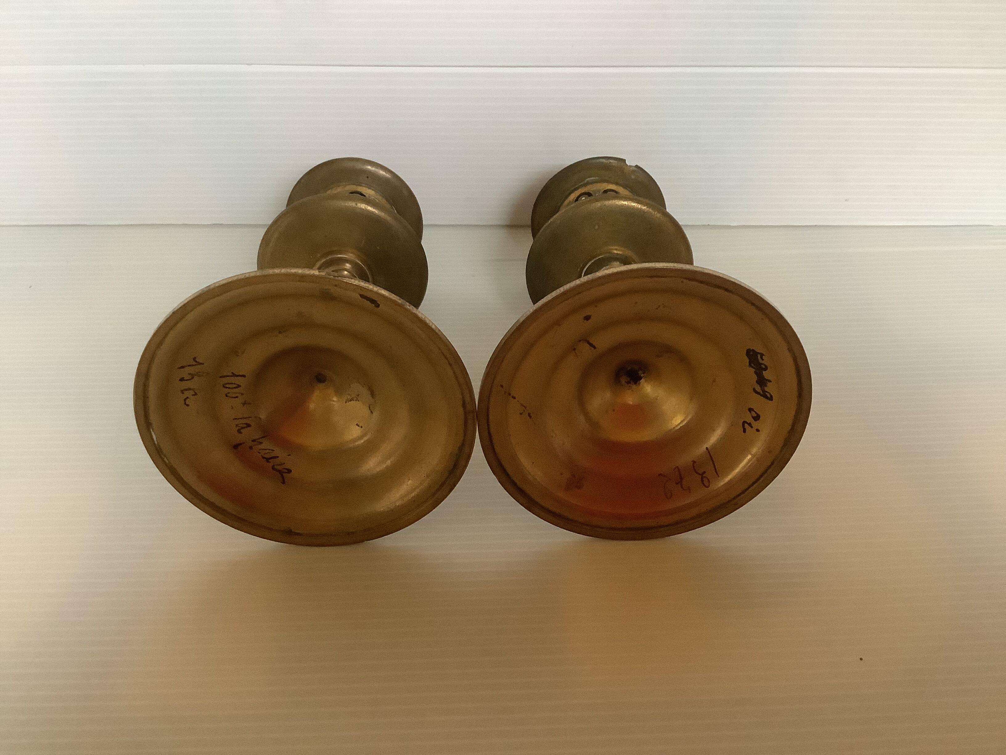 Pair of old brass candle holders