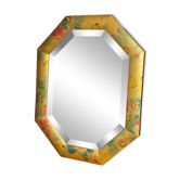 Bevelled mirror, octagonal in shape, made of wood.
