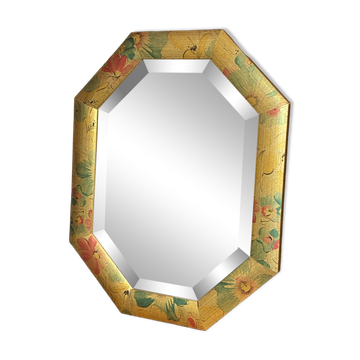 Bevelled mirror, octagonal in shape, made of wood.