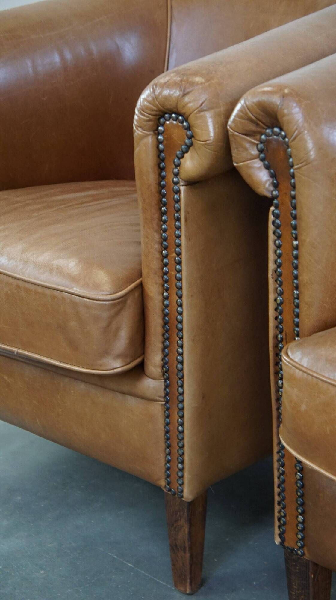 Set of 2 very comfortable light cognac-colored leather club armchairs in English style