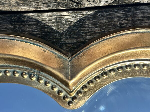 Miroir trèfle en métal doré patiné Diam 66 cm